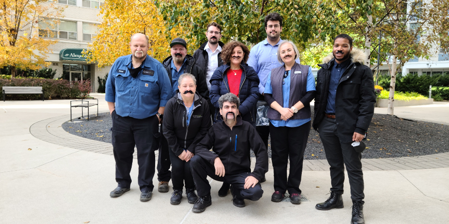 Village Green team with Movember moutaches